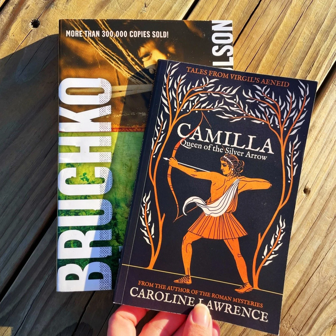 I selected my "C" book to be "Camilla" by Caroline Lawrence! Caroline Lawrence has also written "The Roman Mysteries", which I was originally introduced to in high school Latin class via the BBC show adaptation; it was a