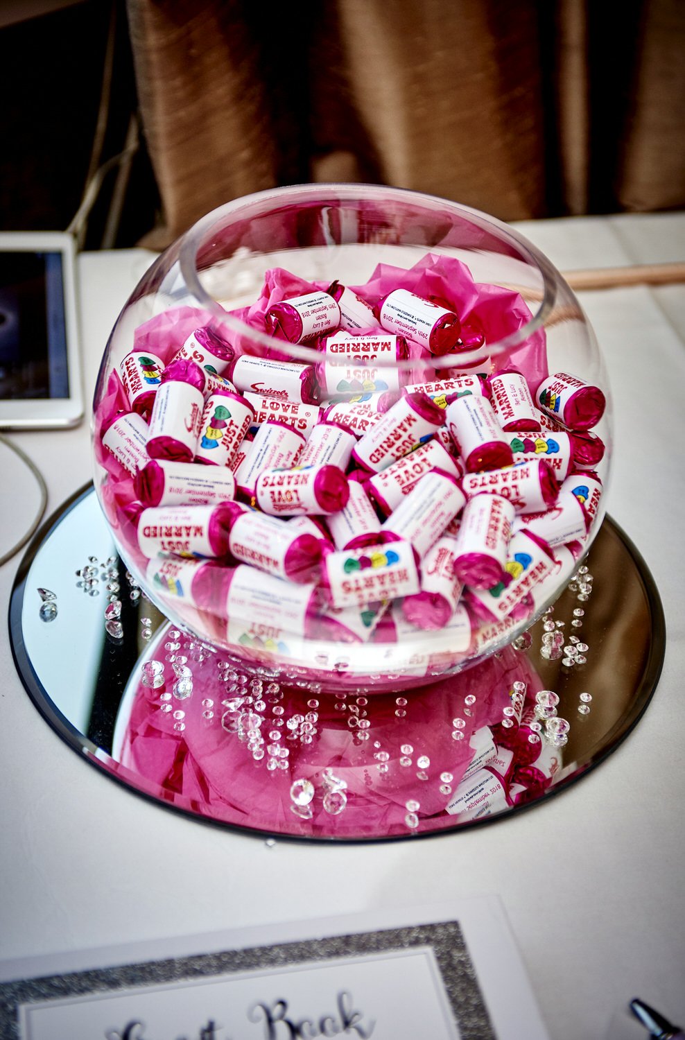 A close up of a jar of sweets available for guests.