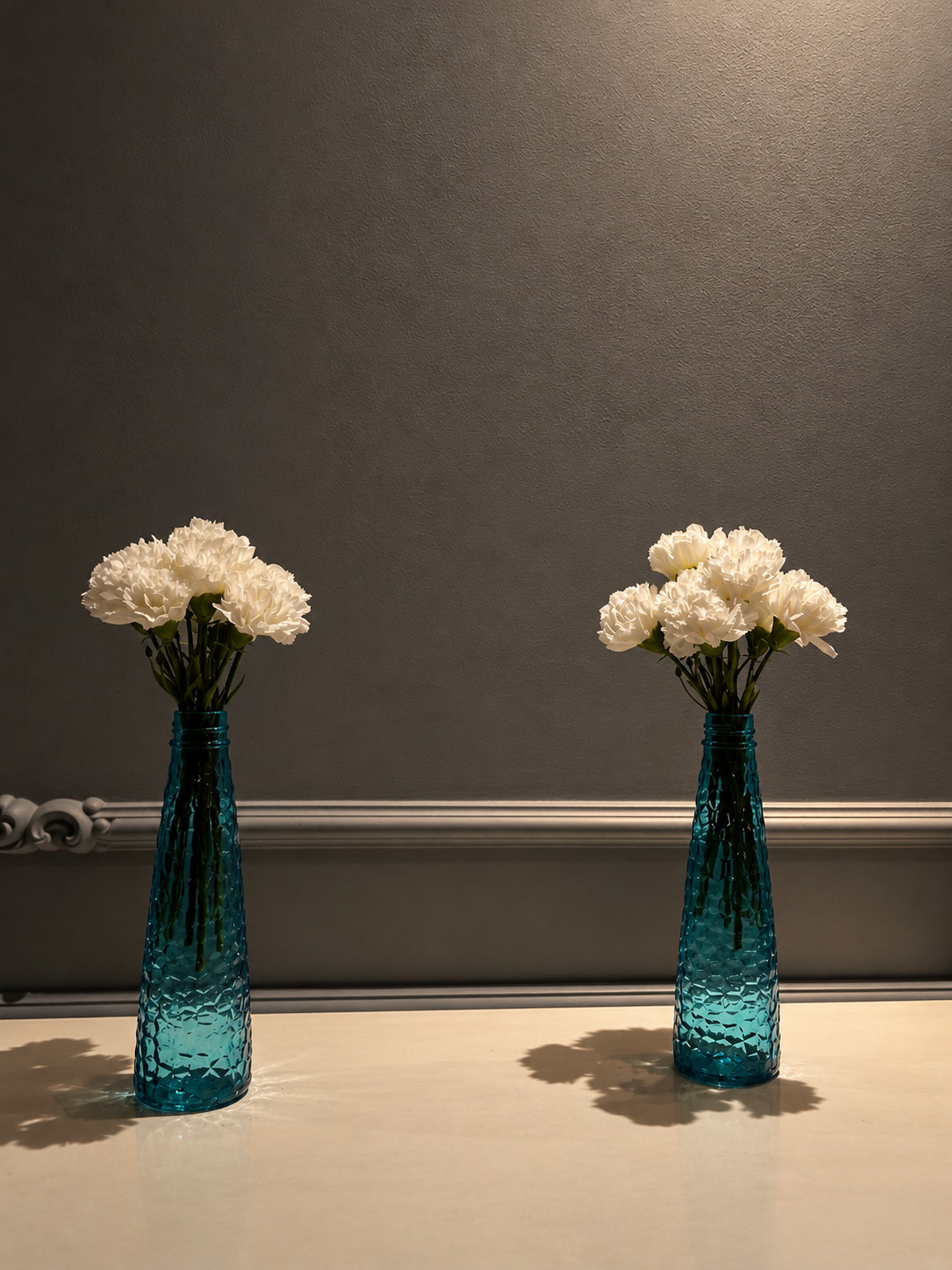 Symmetrical Teal Vase Spa Still Life.png
