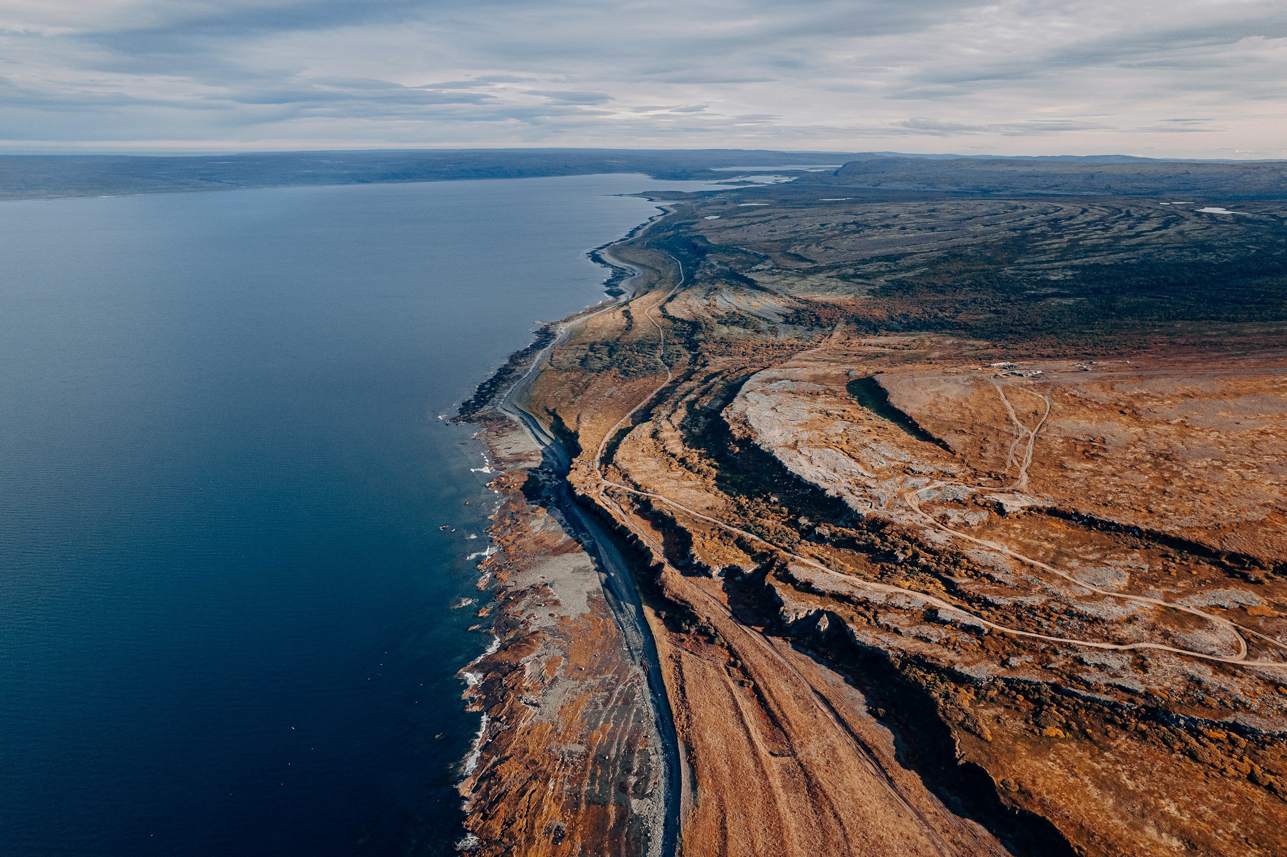 Coastal cliff formation, likely Pacific Northwest or Iceland