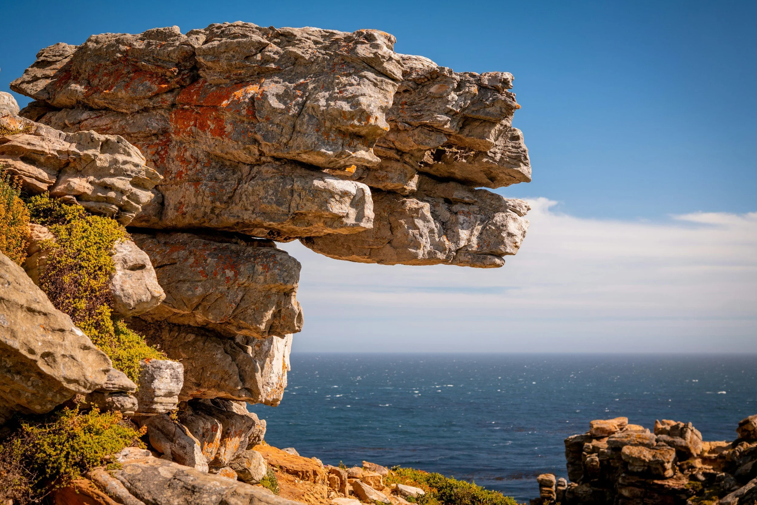Coastal cantilevered rock formation above the sea