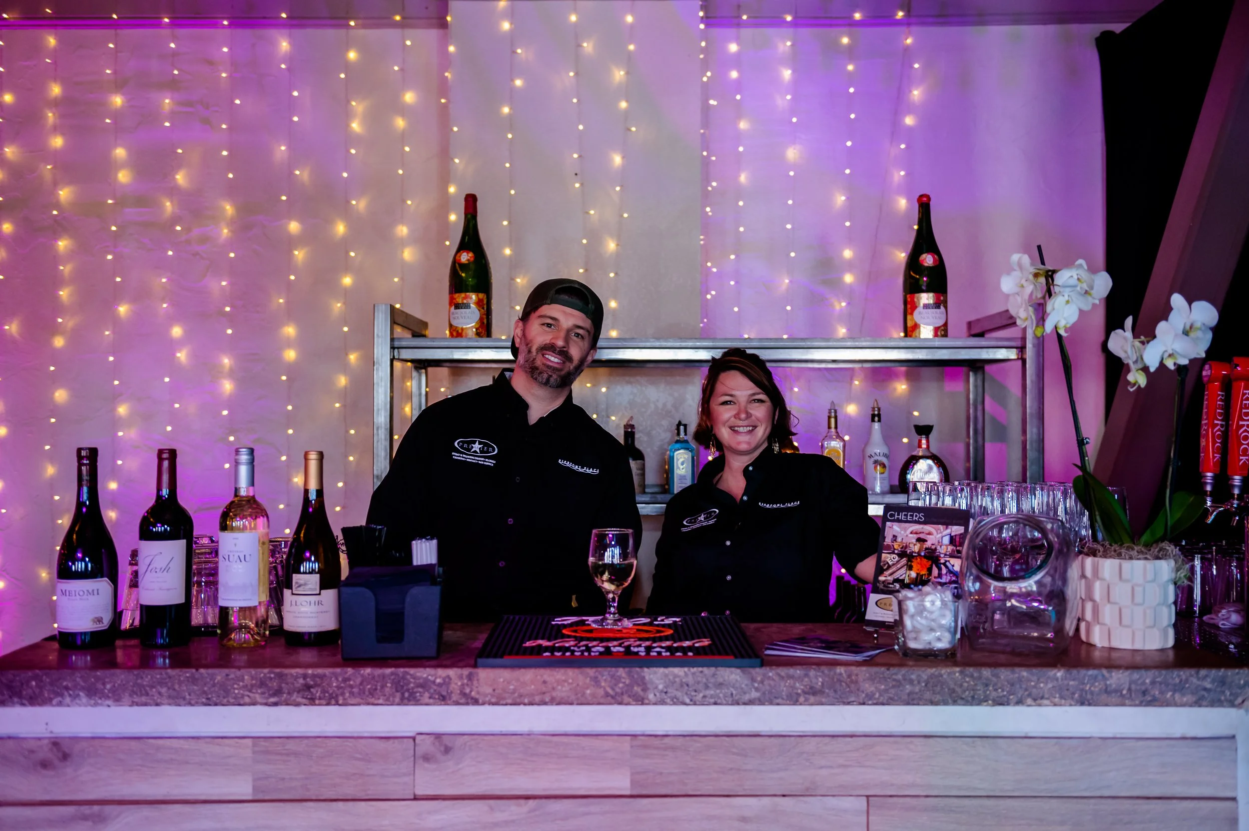 elegant-wine-bar-event-bartenders-smiling.jpeg
