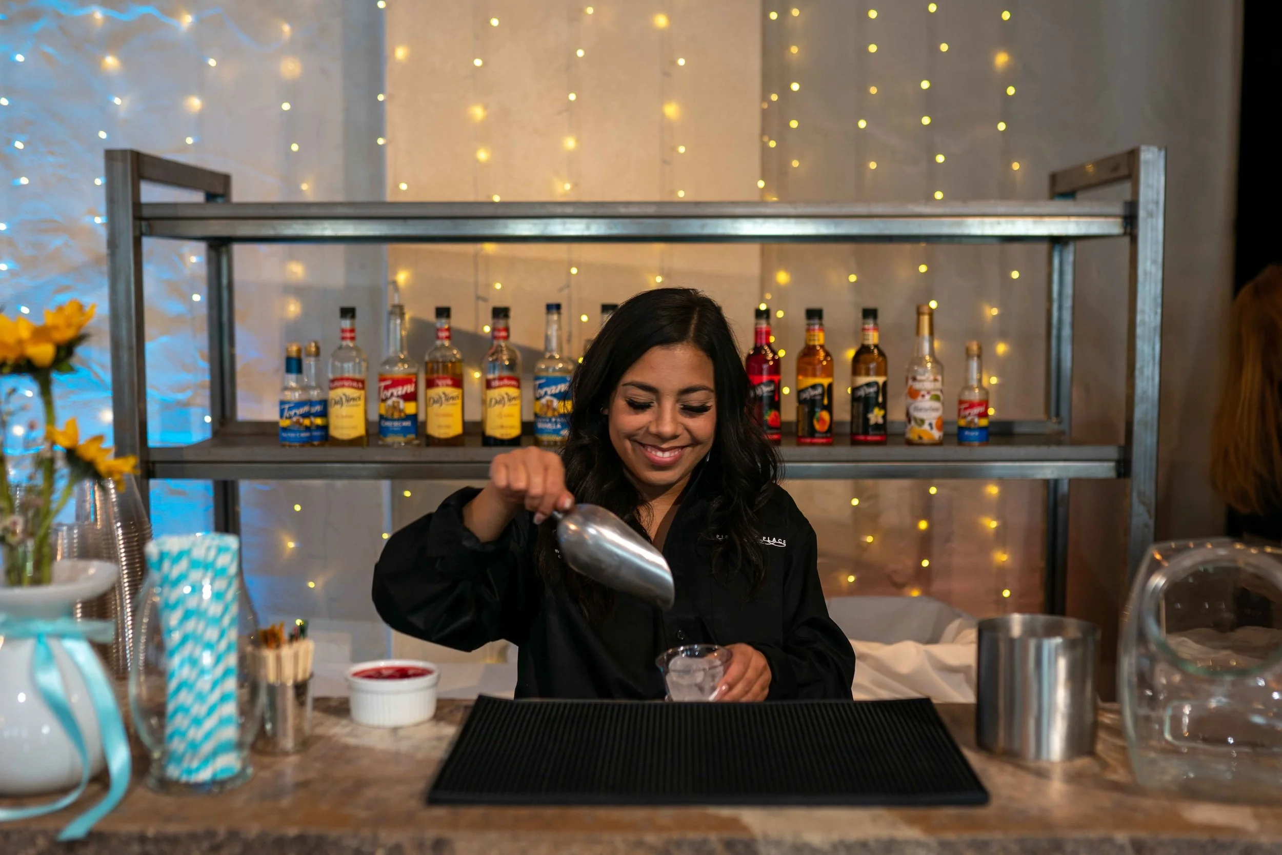 pierpont-place-private-party-bartender-smiling-cocktail-prep.jpg