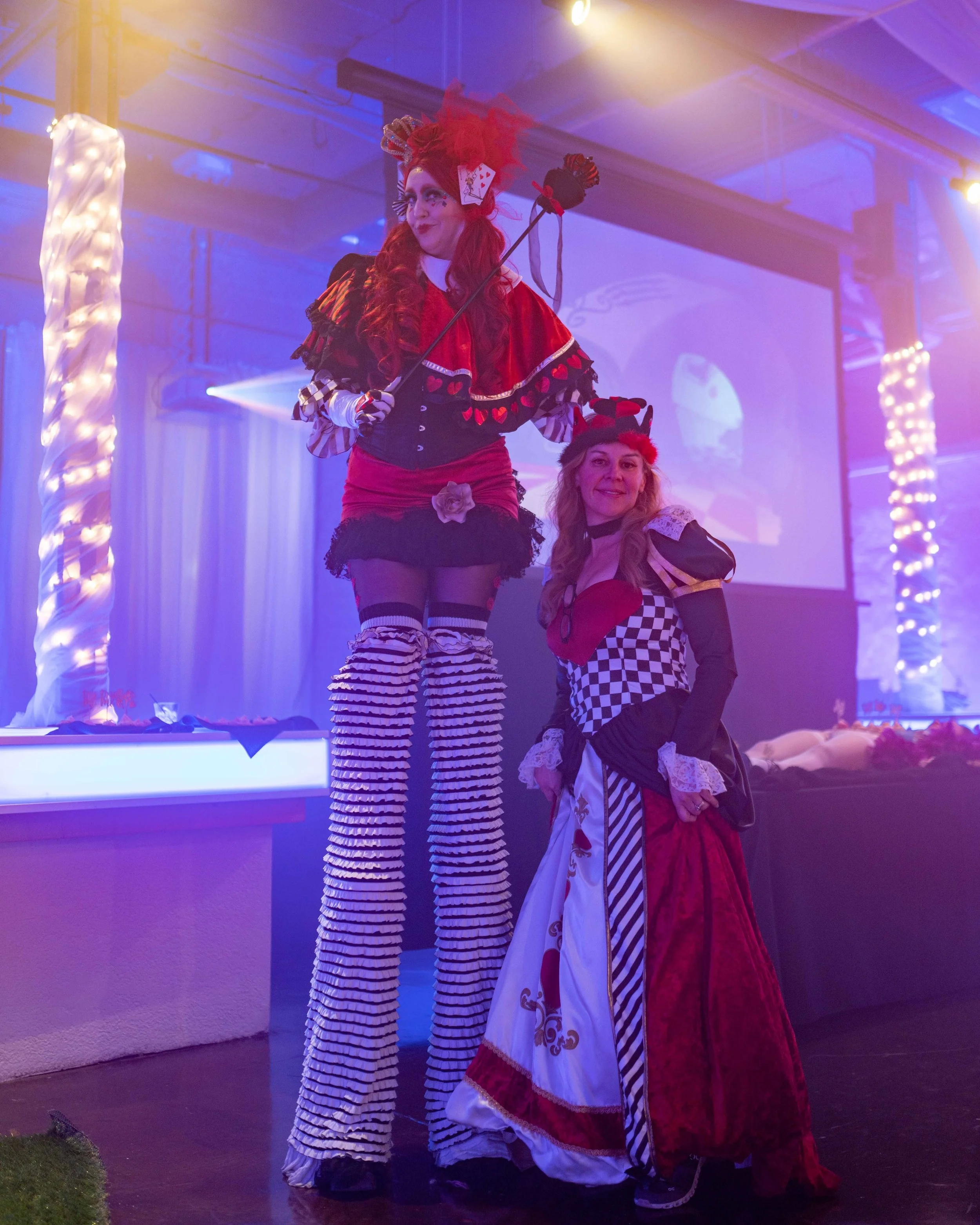 alice-in-wonderland-stilt-walkers-themed-party.jpg