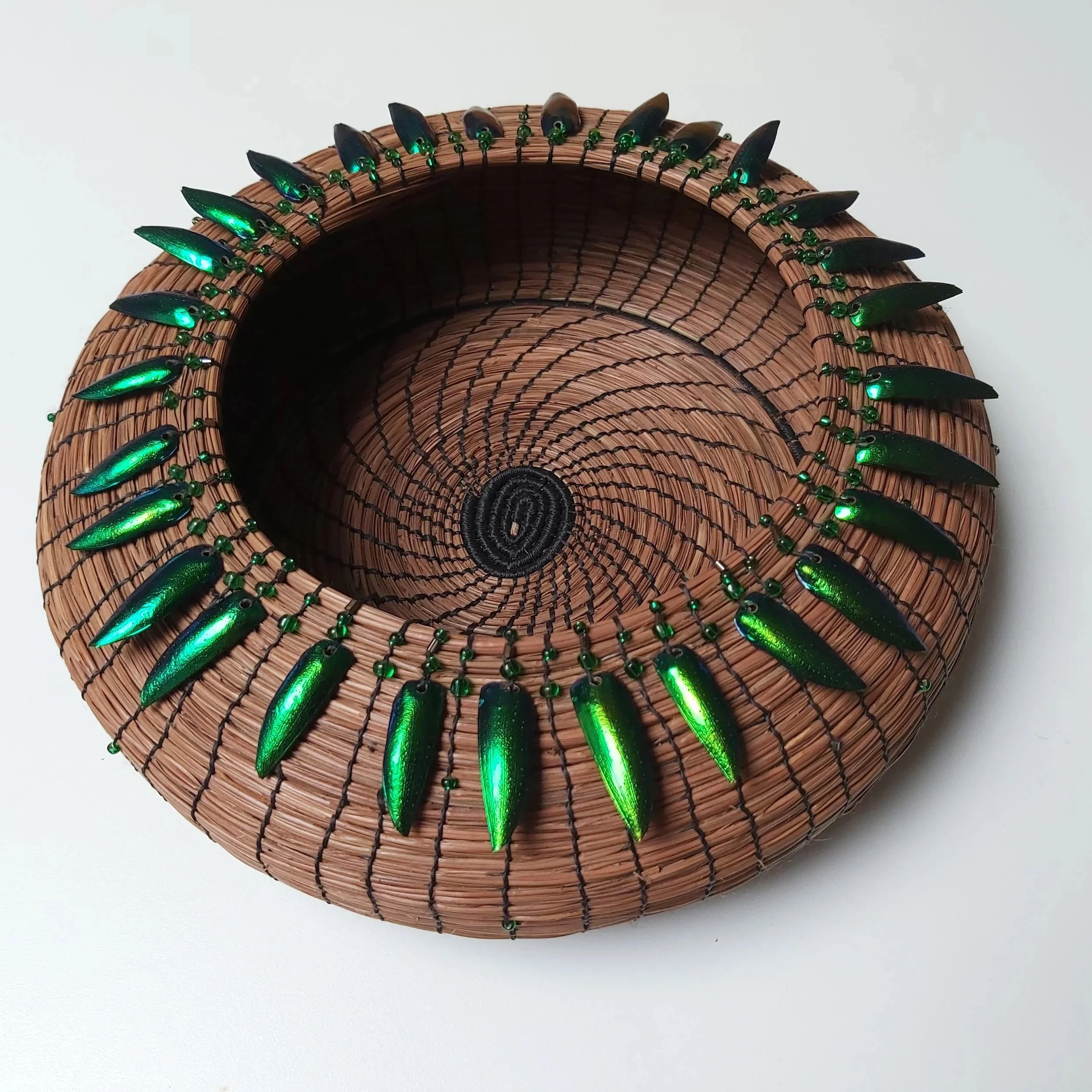 Basket with beetles wings.