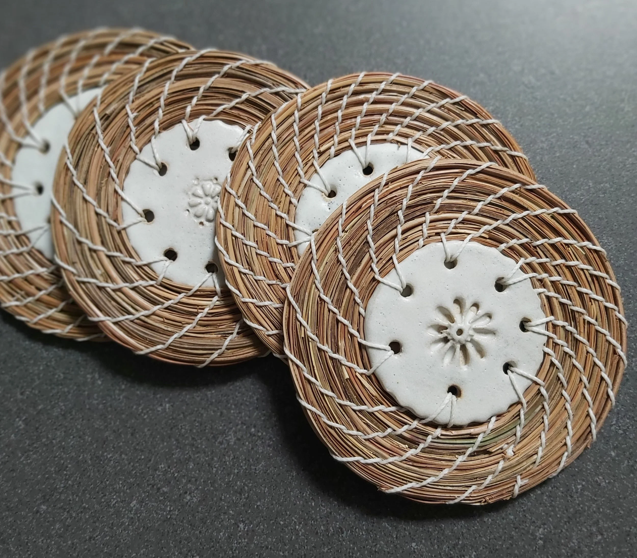 Coasters with a ceramic centre.