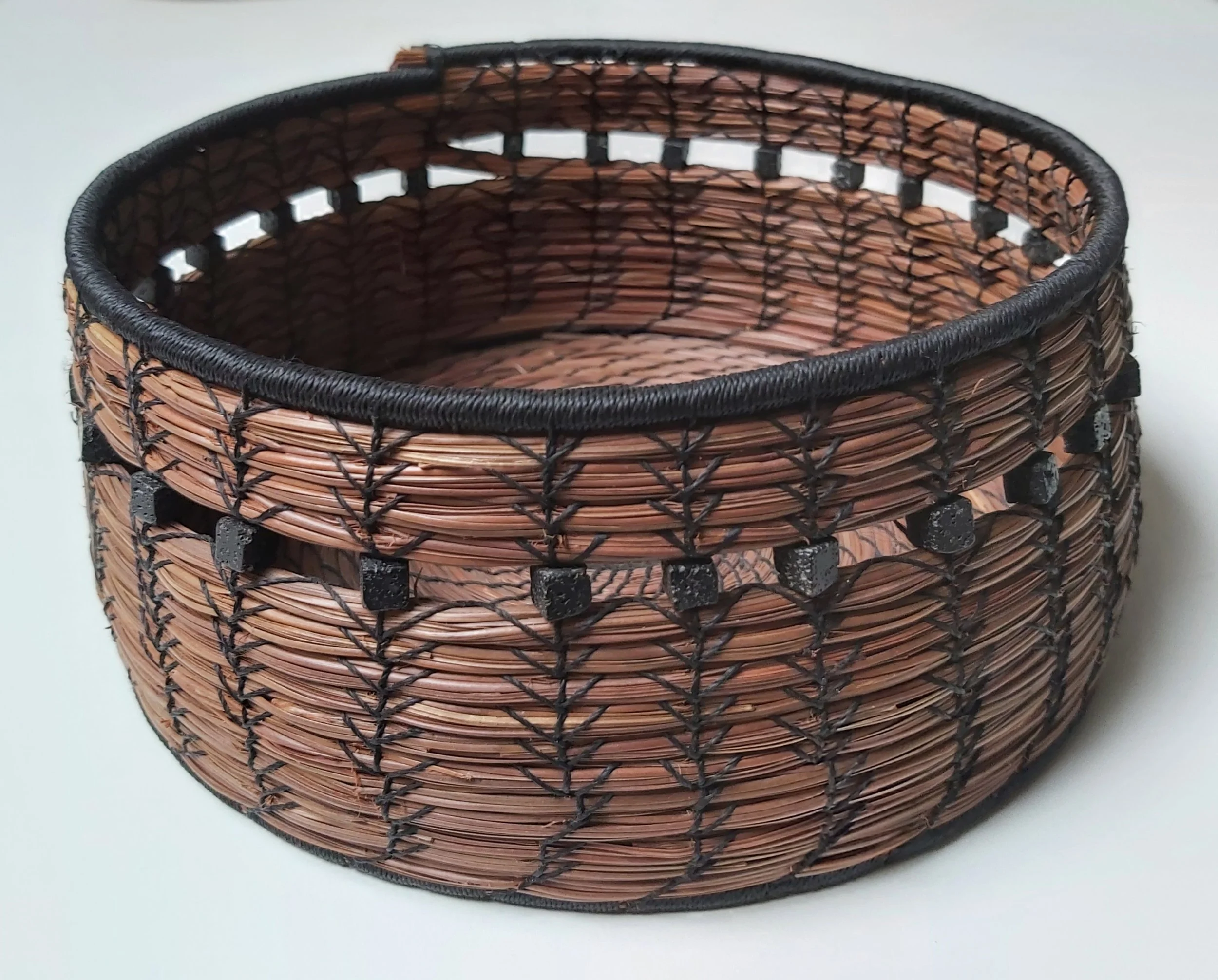 Experimenting with the wheat stitch.