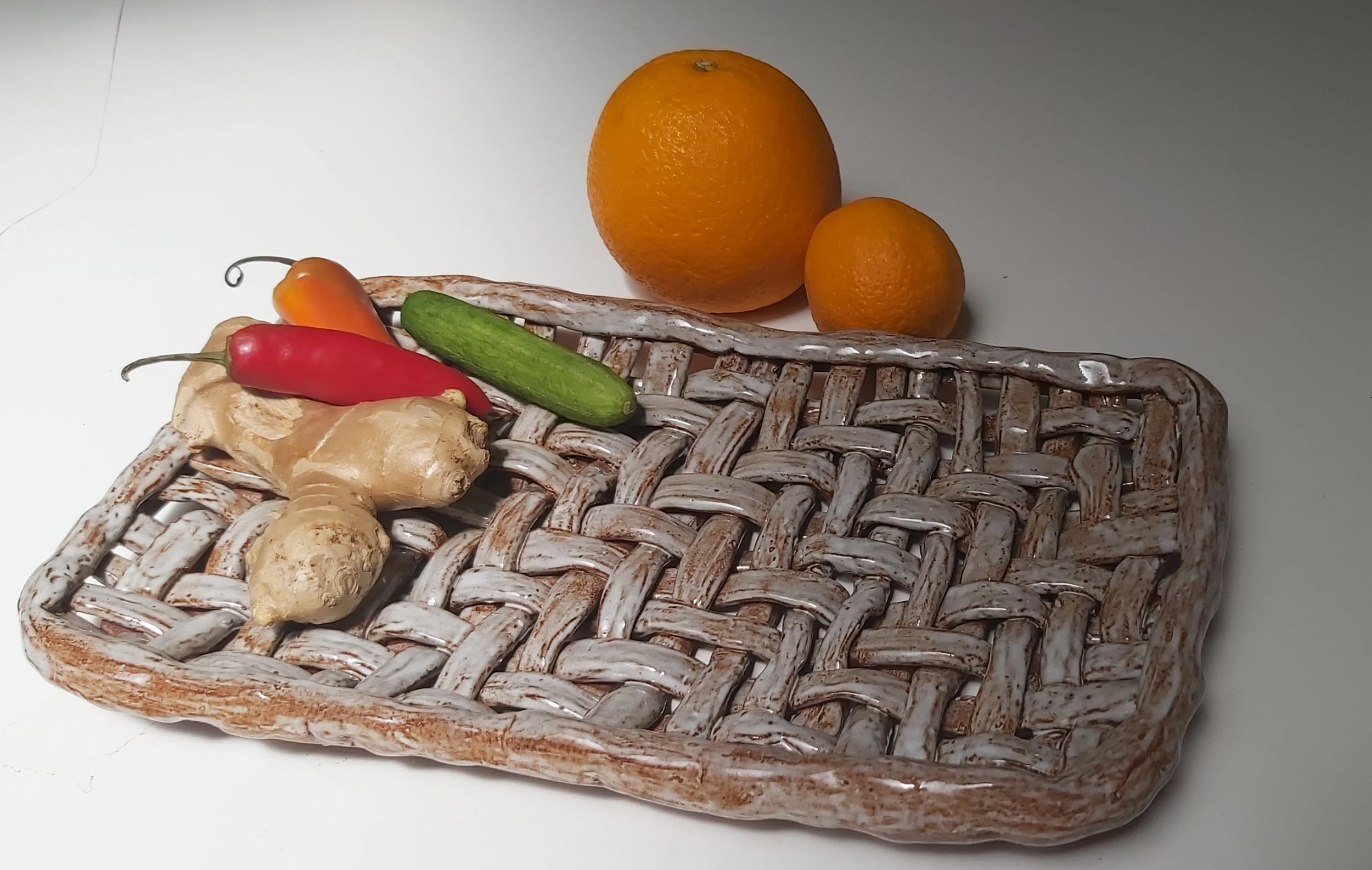 Woven clay tray.