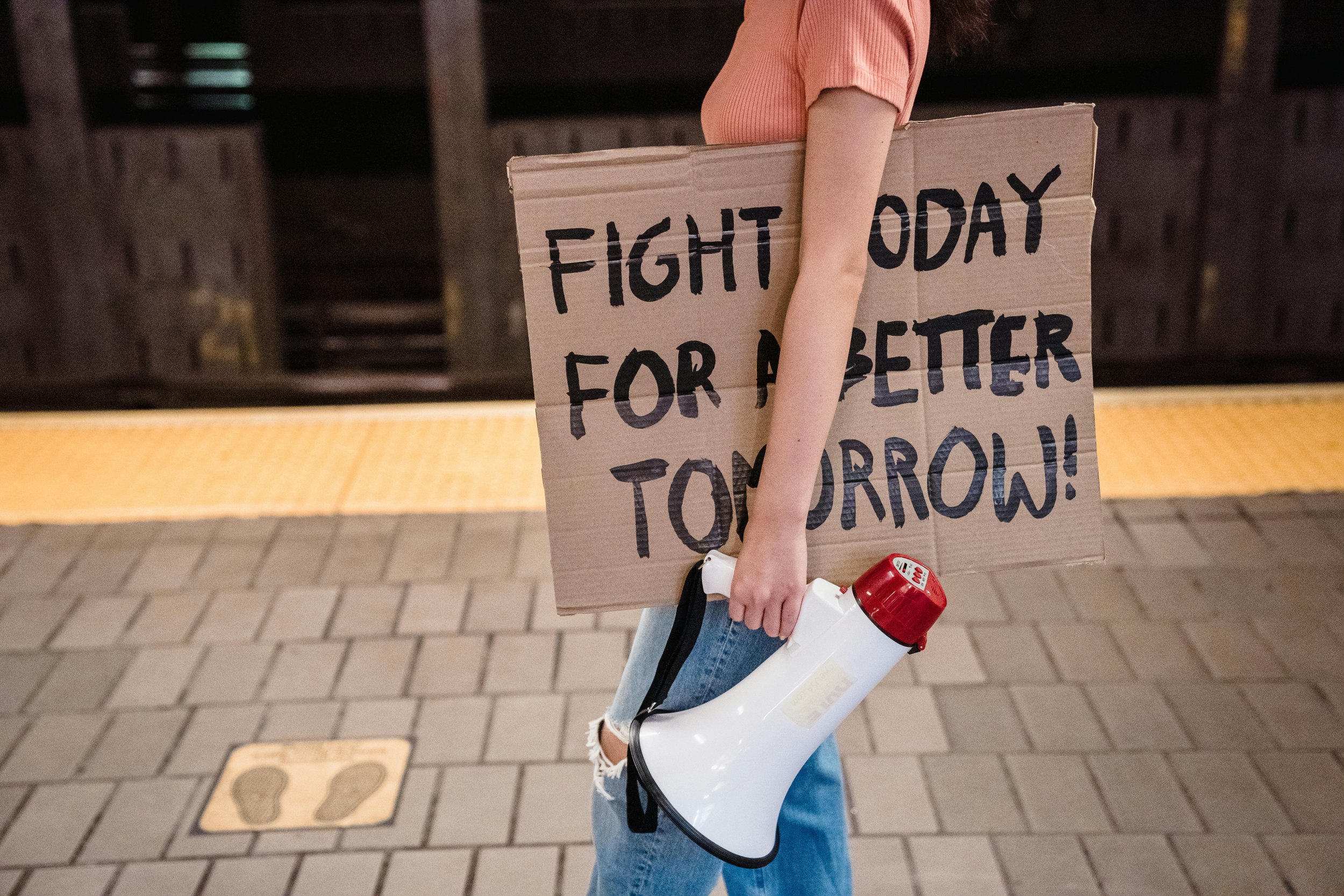 Woman holding sign for rally