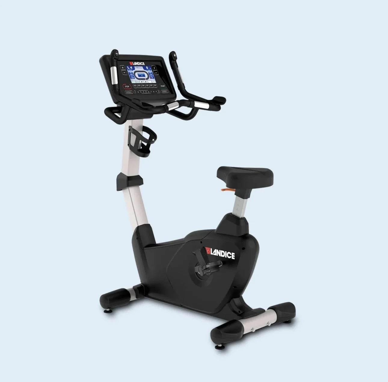 Black and white stationary exercise bike with digital display and handlebars, against a light blue background.