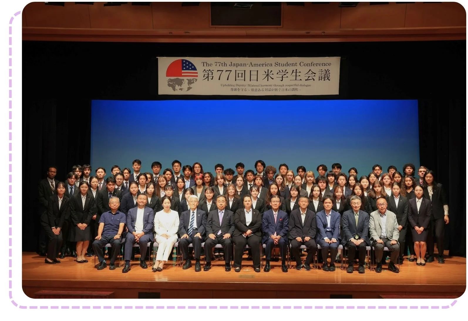 Delegates and speakers gather on stage for the 77th Japan-America Student Conference Opening Ceremony in Japan.