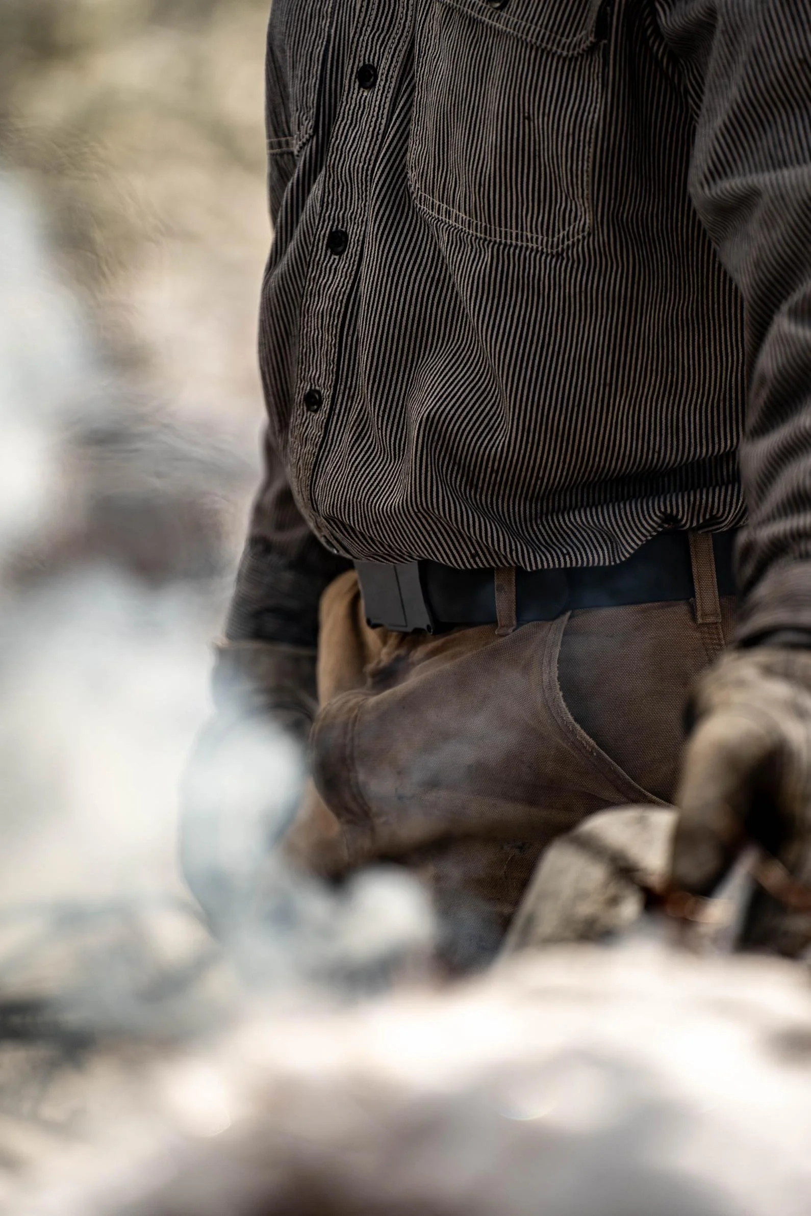 Close-up of a man wearing the Apogee Belt in Northwest Montana, captured during the Apogee Belt field test photoshoot.