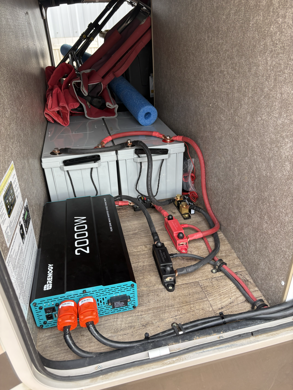 400Ah bank, DC distribution, unique non-integrated 2000W inverter tied to remote receptacle box. Fifth-wheel trailer