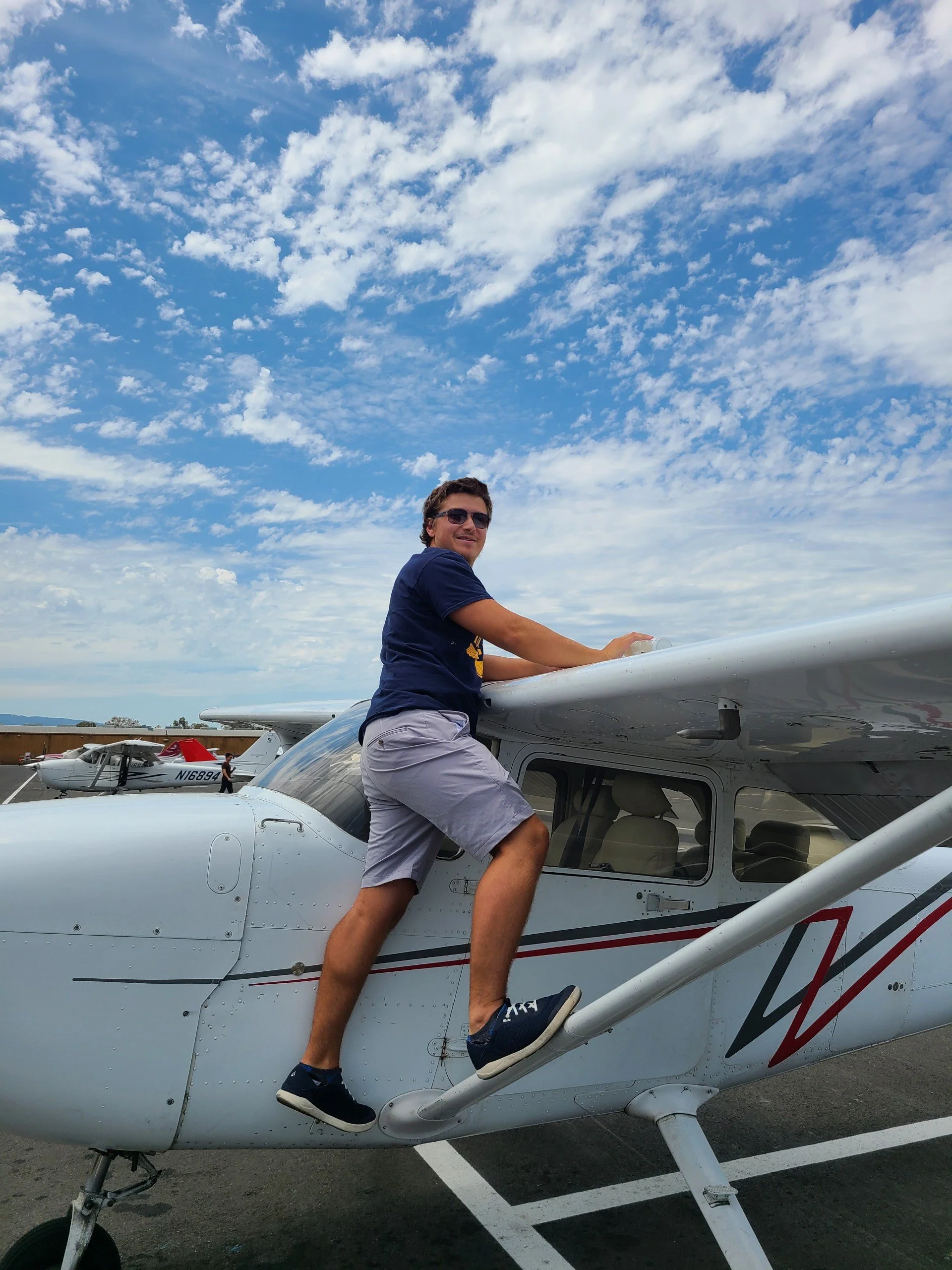Instructor in San Jose fueling an airplane