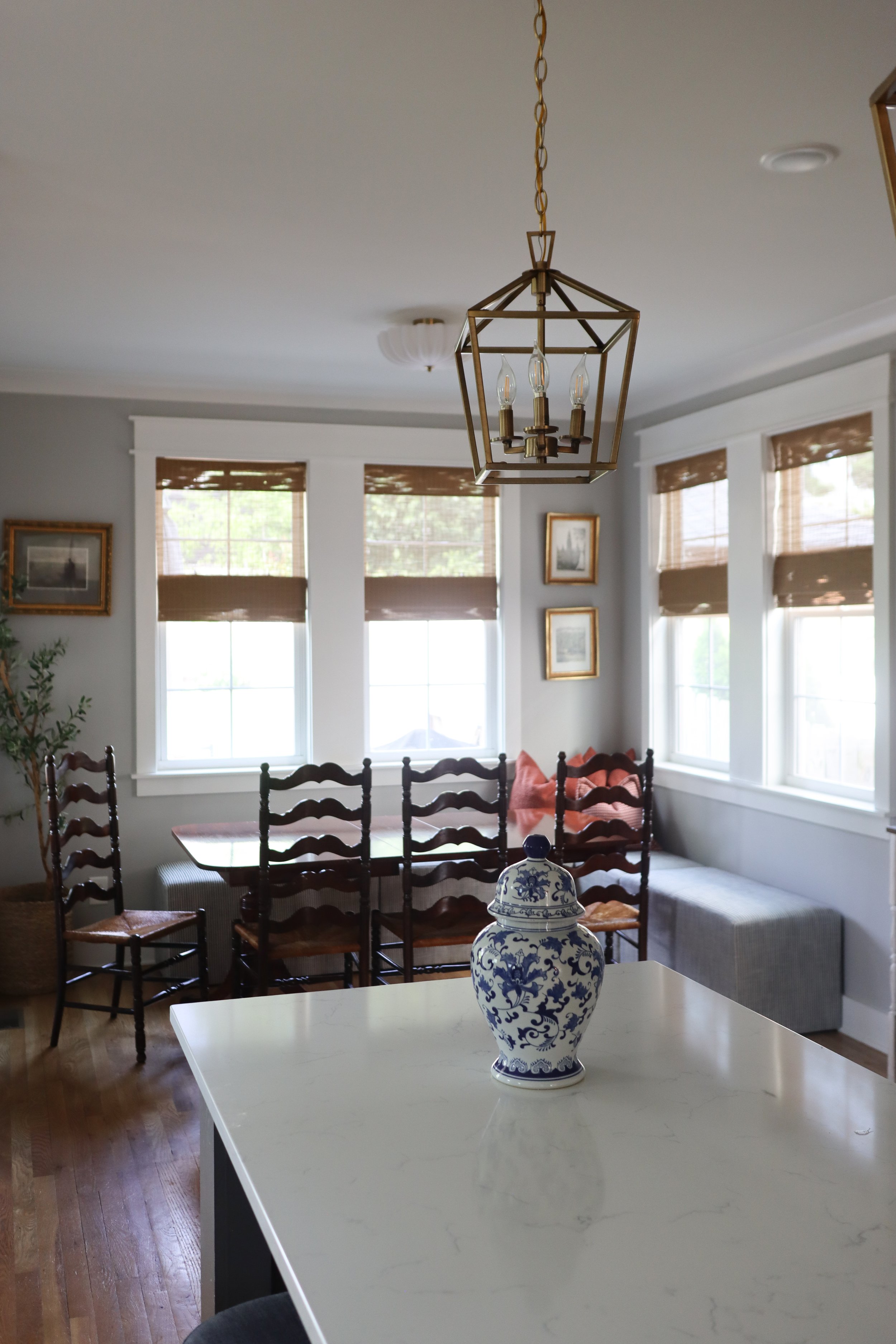 Downstairs design featuring traditional style in the kitchen, dining, and living room. Designed for a Nashville family who wanted warm finishes, timeless details, and functional flow between spaces.