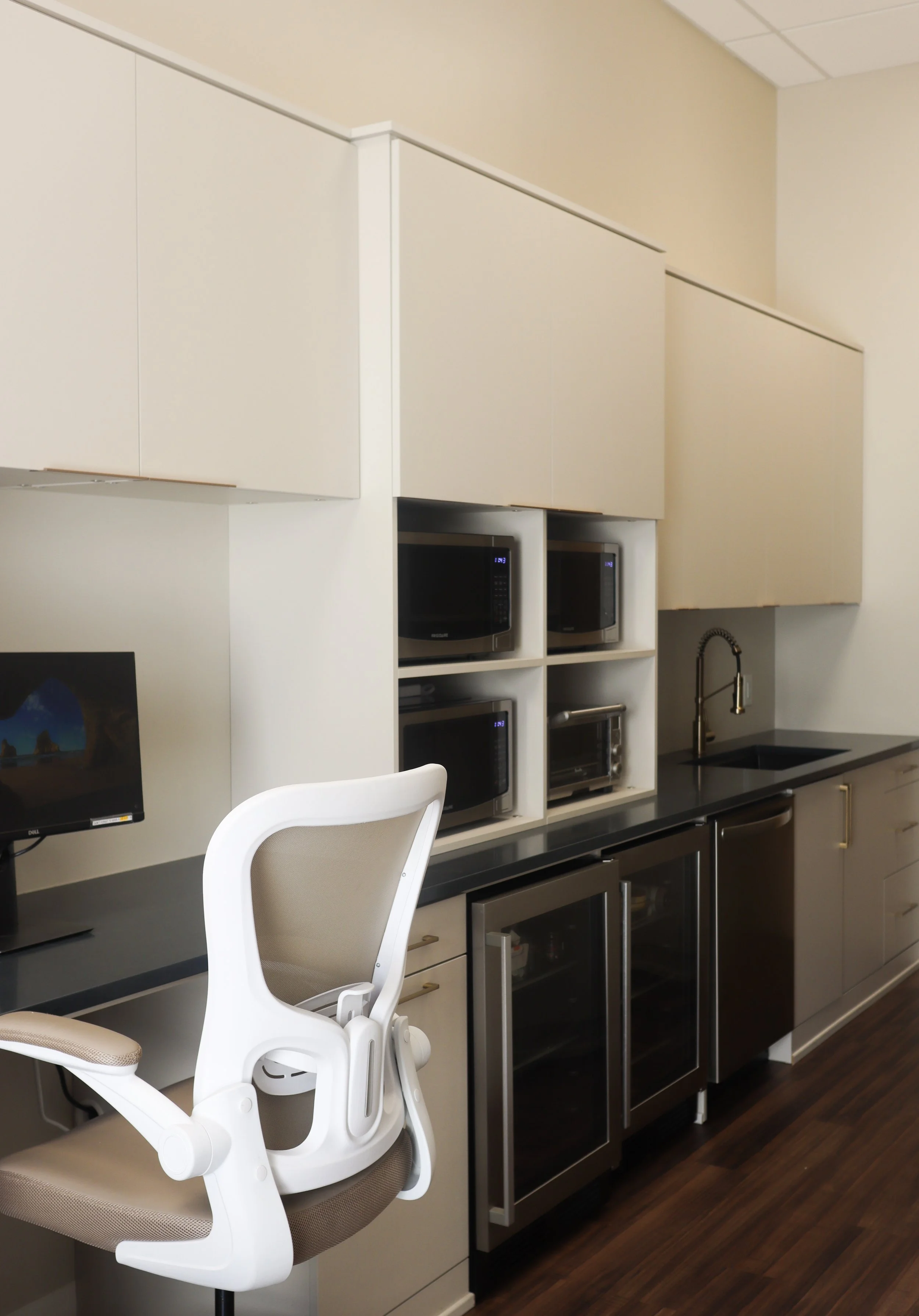 After: A modern and clean break room that their staff love