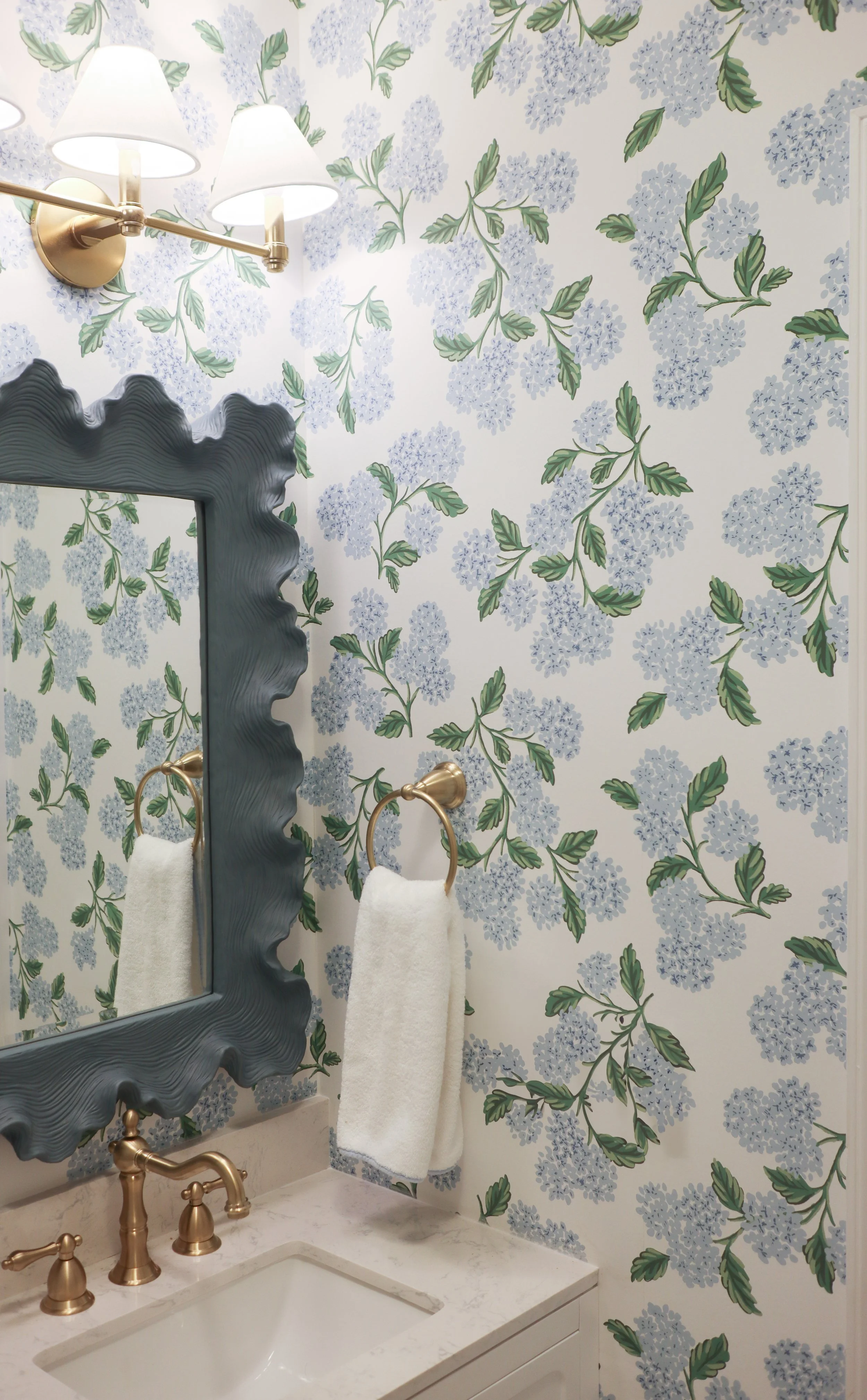 Blue and White Hydrangea Wallpaper Bathroom with Brass Details