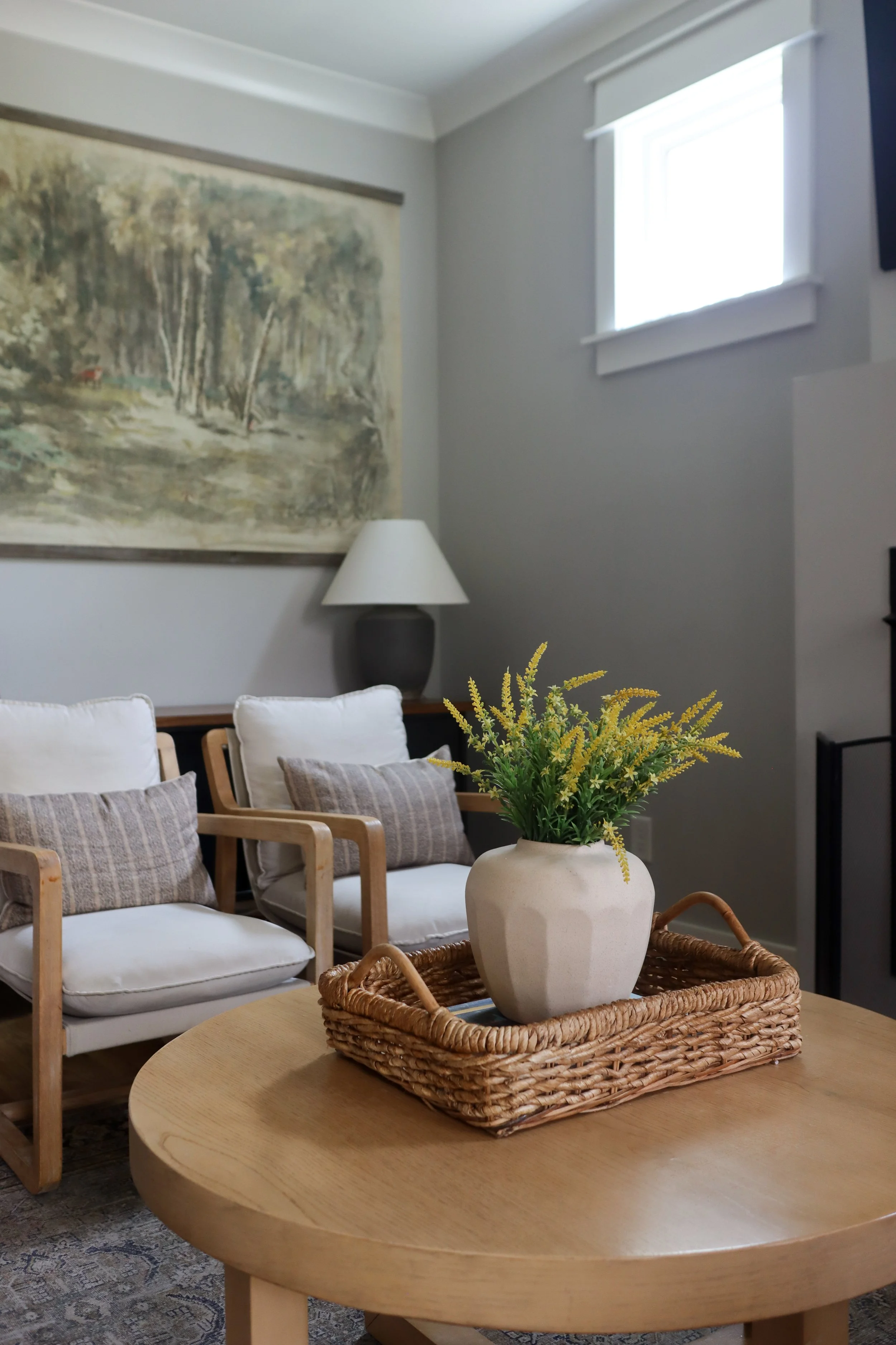 Downstairs design featuring traditional style in the kitchen, dining, and living room. Designed for a Nashville family who wanted warm finishes, timeless details, and functional flow between spaces.