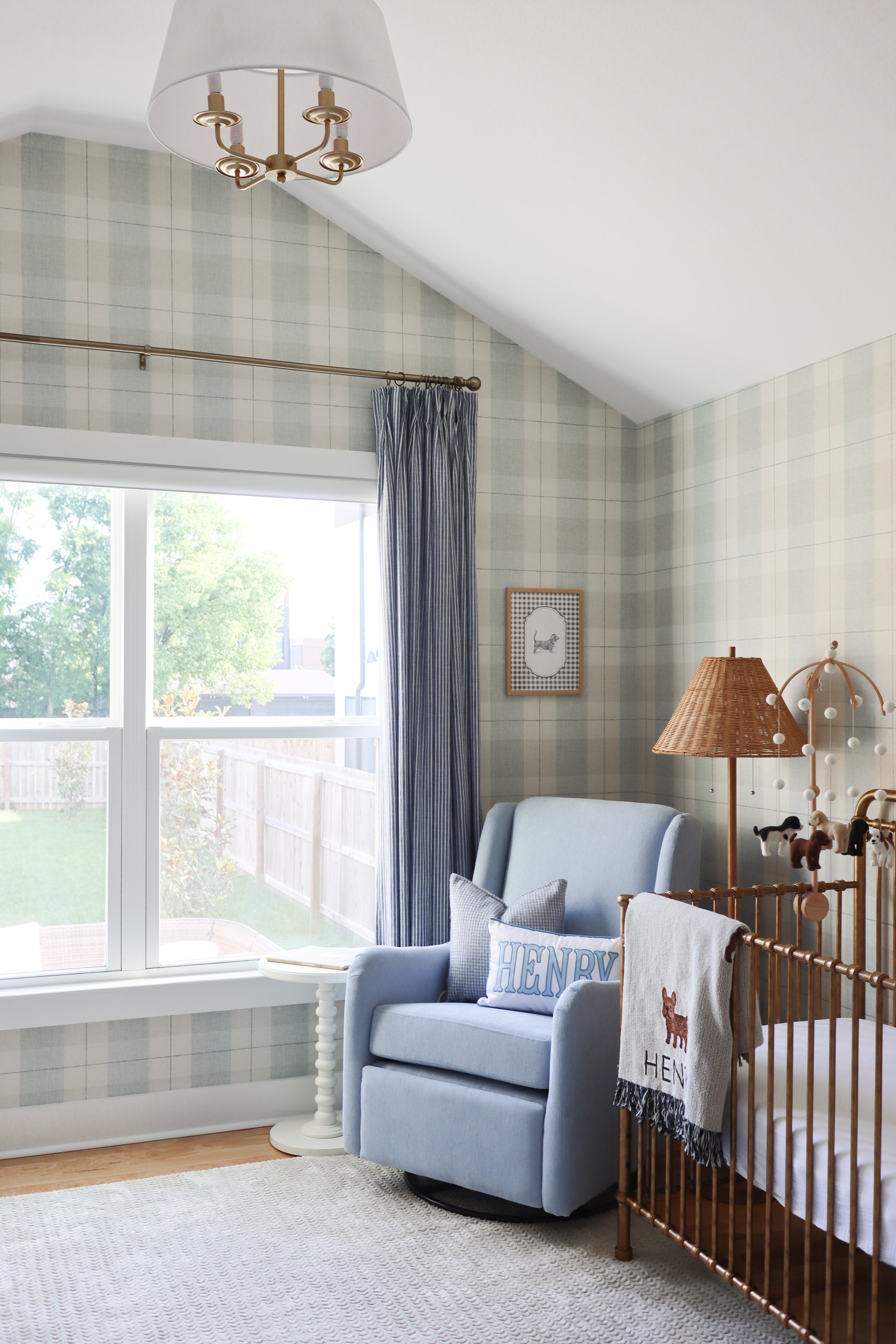 This Nashville nursery design blends vintage charm, preppy style, and timeless furnishings to create a beautiful space filled with warmth and personality.