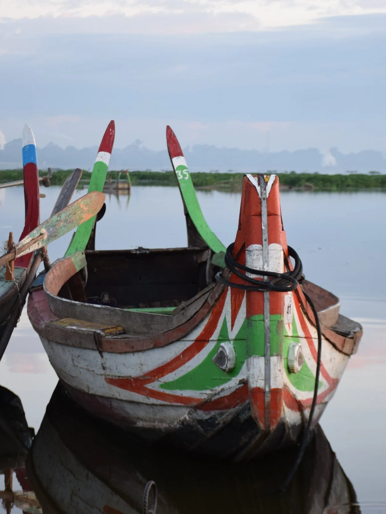 Painted boat at Taungthaman Lake in Myanmar
