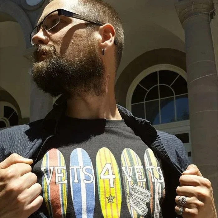 Travis D. in Santa Cruz, CA wearing a Vets 4 Vets shirt.