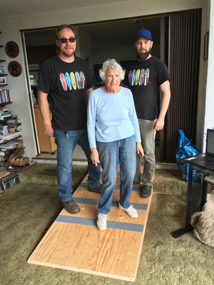 Volunteers doing a home visit.