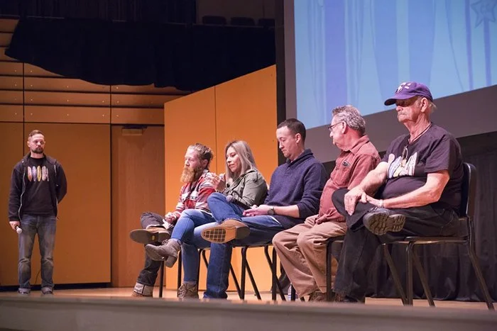 Vets 4 Vets members on a stage.