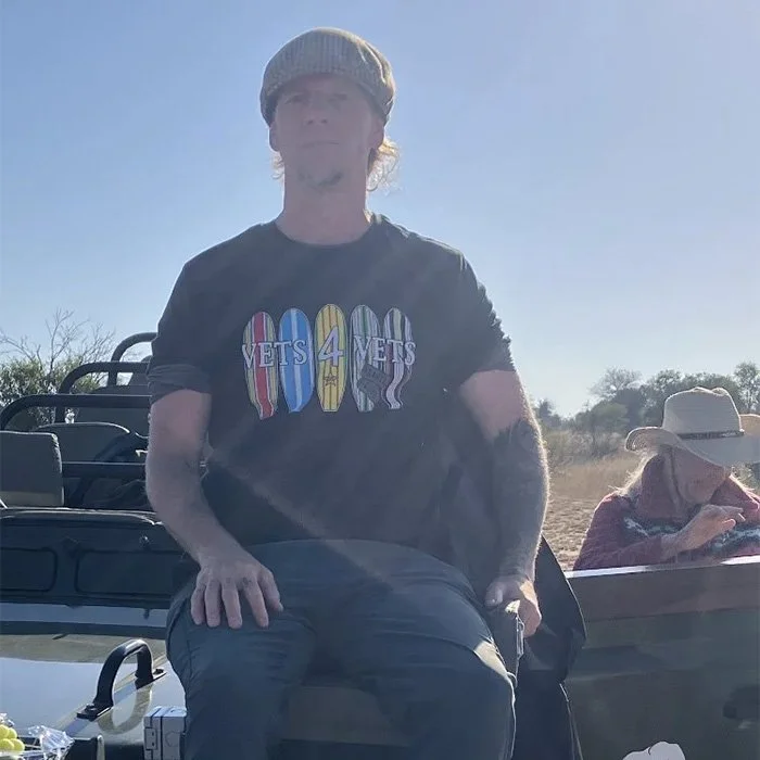 Harry P. in South Africa wearing a Vets 4 Vets shirt.