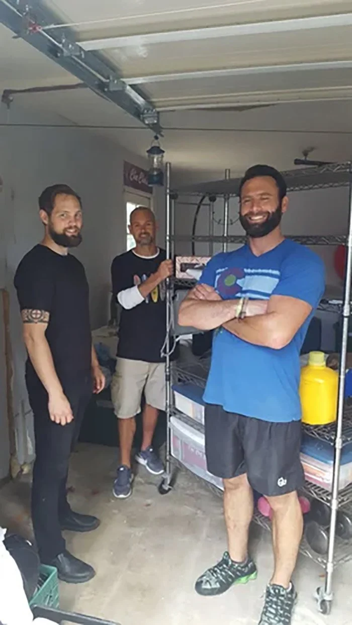 Volunteers in a garage