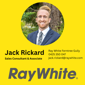 Business card featuring a smiling man in a suit with a green outdoor background, yellow border, and Ray White branding. Includes name Jack Rickard, title Sales Consultant & Associate, contact number, and email.