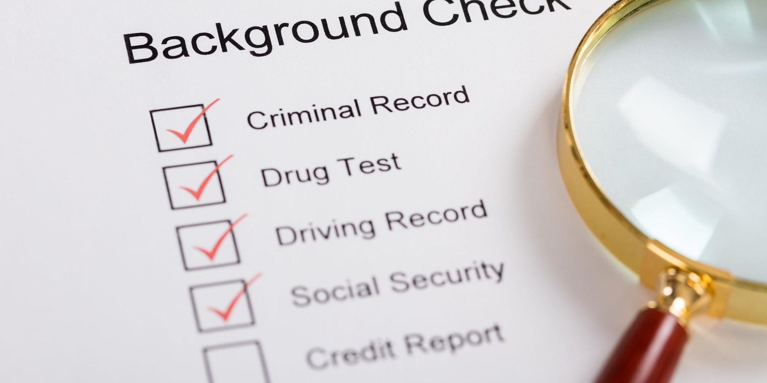 A background check form with checked boxes for criminal record, drug test, and driving record, alongside a magnifying glass.