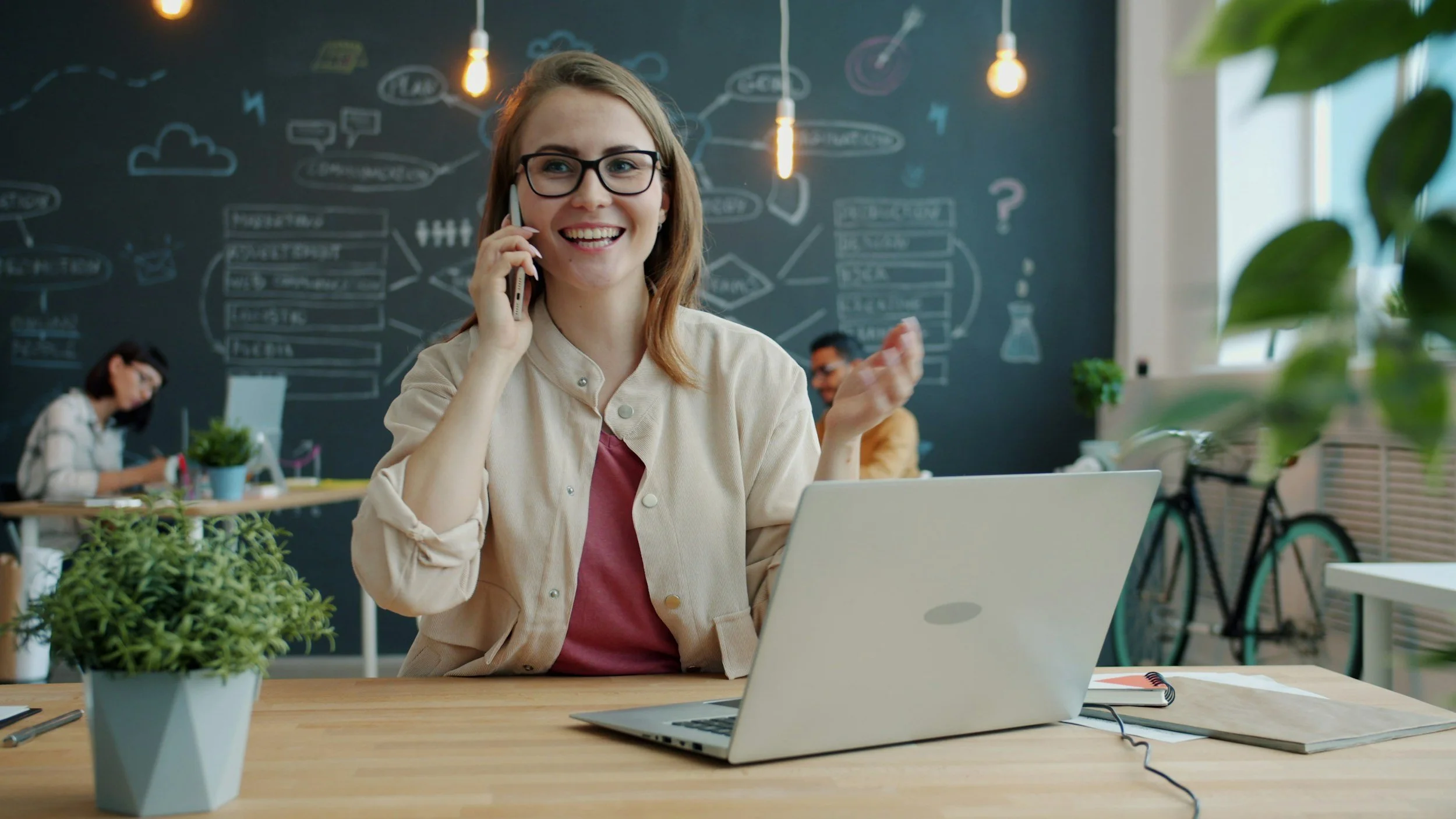 Therapist smiling on a consult call, answering a private pay client's question about insurance