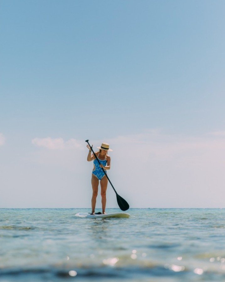 Paddleboarding on the Caribbean during a free afternoon at the retreat