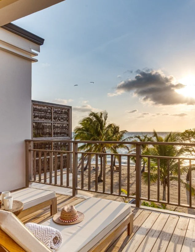 Beachfront deck at Itz'ana Resort in Placencia, Belize, where retreat afternoons are your own