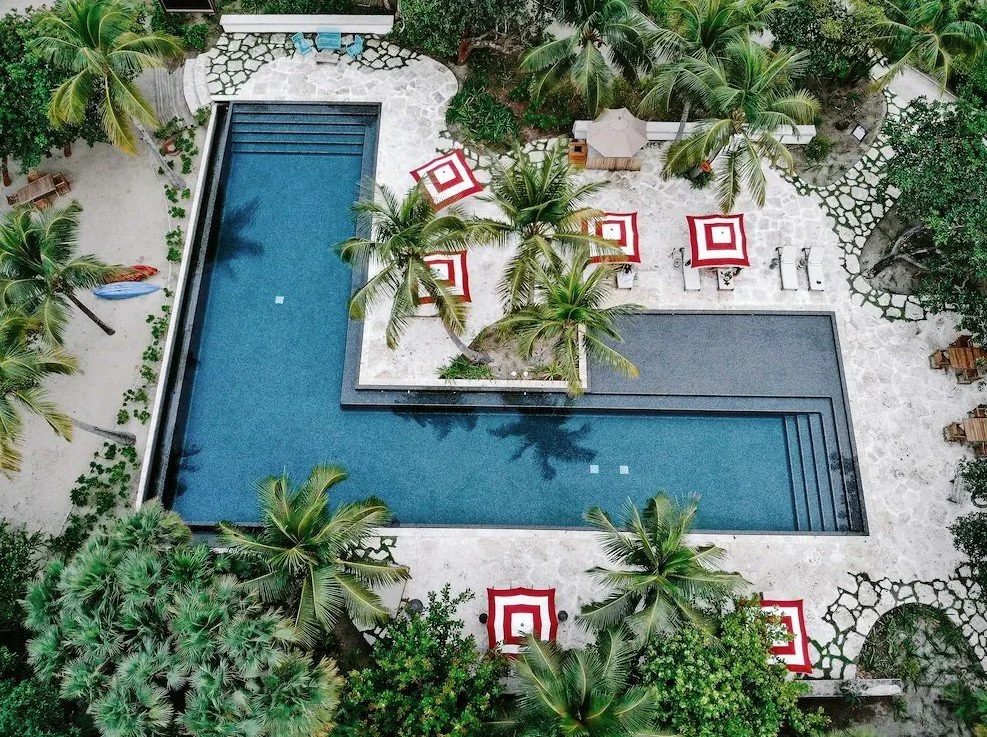 Overhead view of the pool at Itz'ana Resort in Placencia, Belize