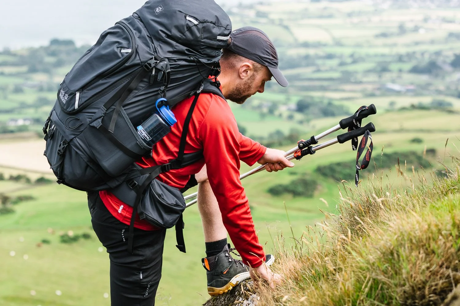 Hiker climbing on Scawt Hill in the Antrim Hills