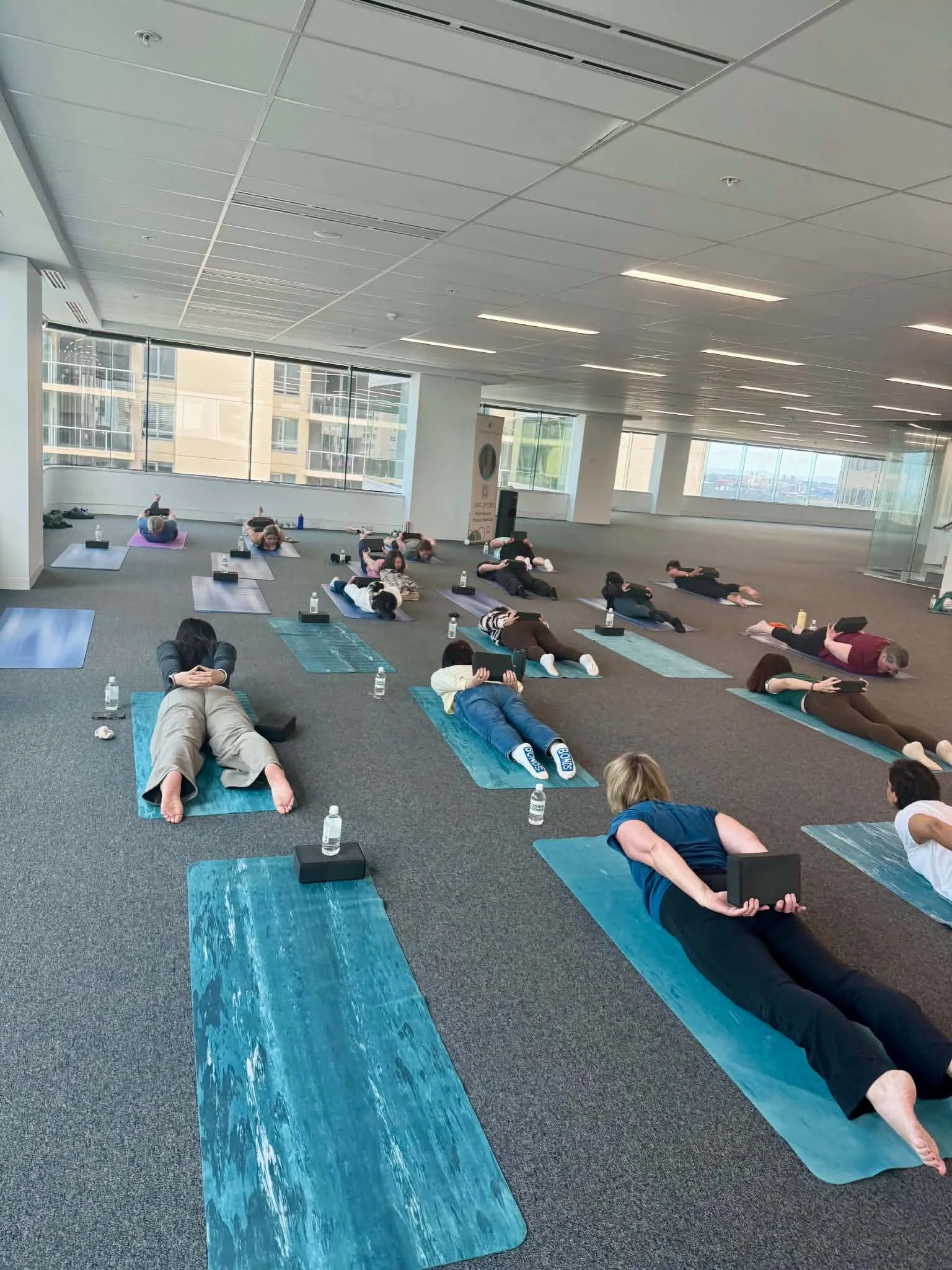 How Workplace Yoga Can Support Employee Wellbeing, Stress and Psychosocial Health