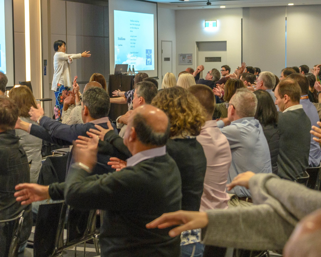 Refreshing a conference with a stretch and breath break