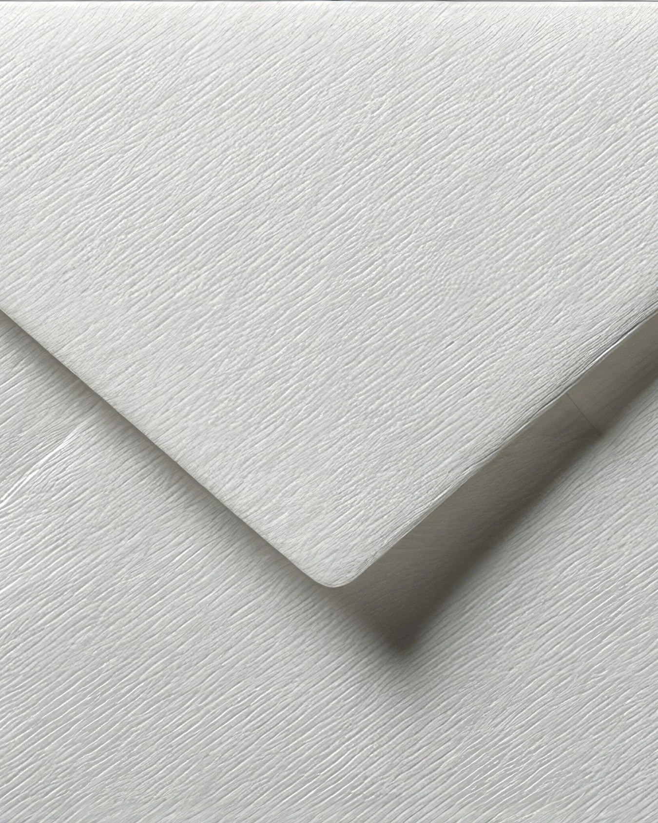A close up of a high quality envelope for a wedding invitation.