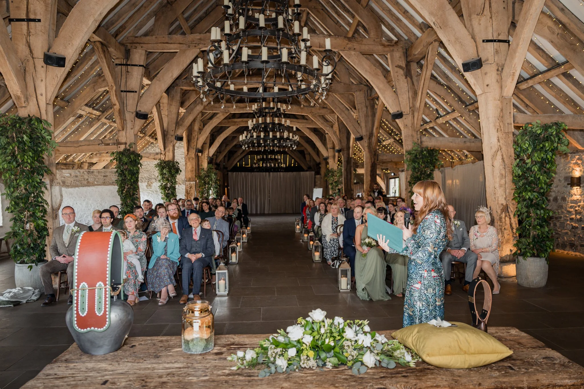 A modern wedding ceremony in a rustic barn.