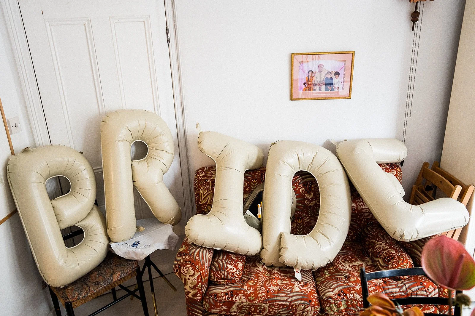 Balloons that spell the word BRIDE.