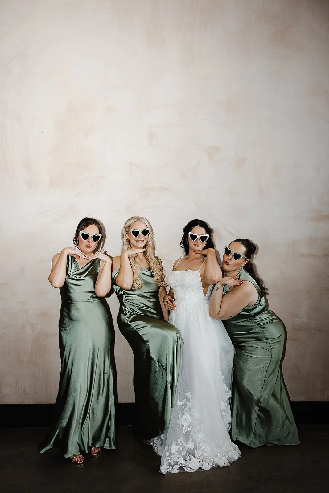 Marie and he bridesmaids, having fun posing in shades.