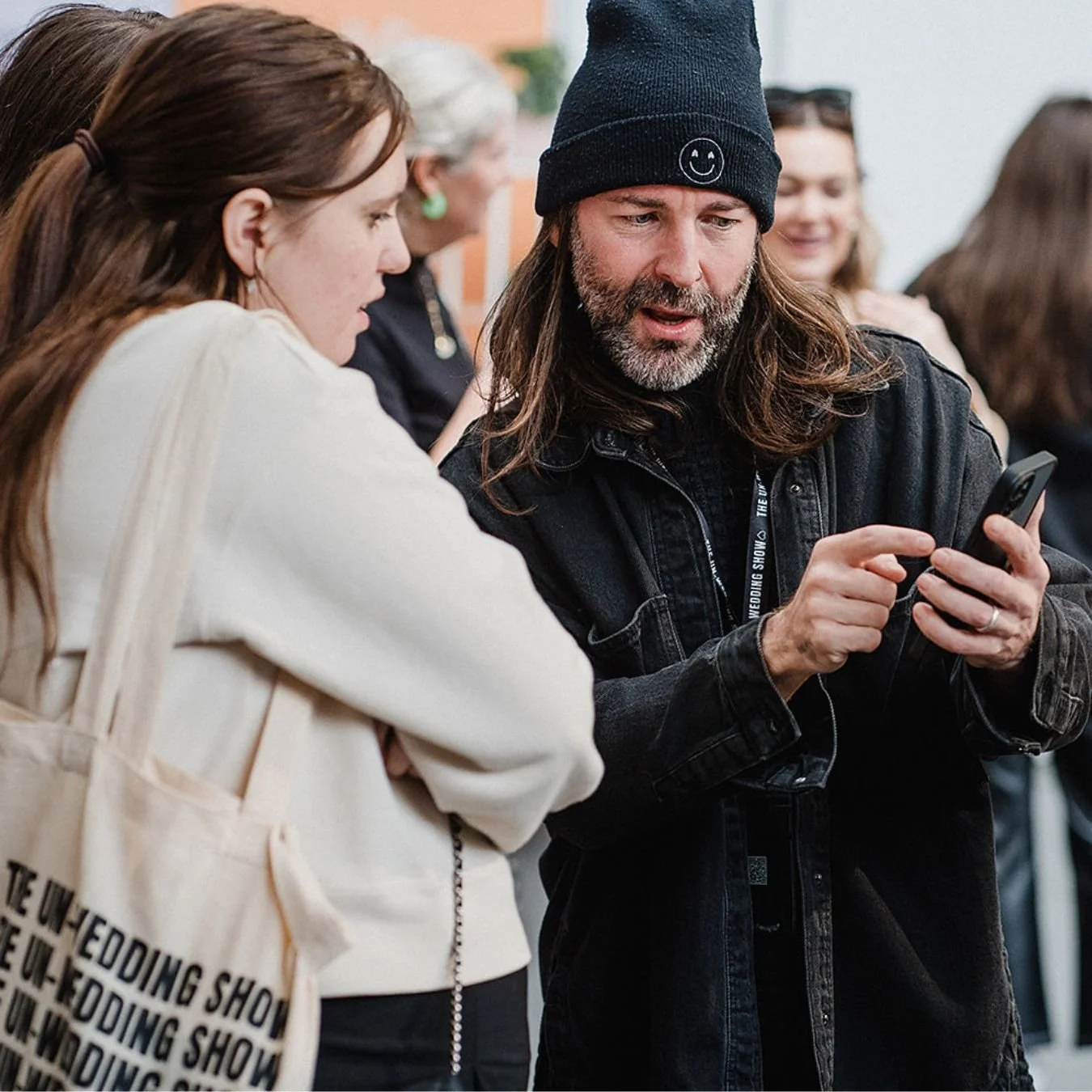 The Un-Wedding Show supplier talking to some attendees.