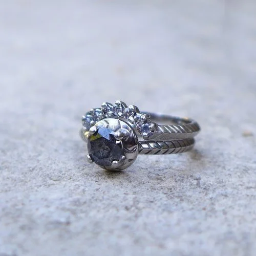 Stunning salt and pepper diamond engagement and wedding ring stack by Daniel Darby Jewellery Designer. Handcrafted in the UK, this unique silver design blends vintage charm with modern elegance for contemporary brides.
