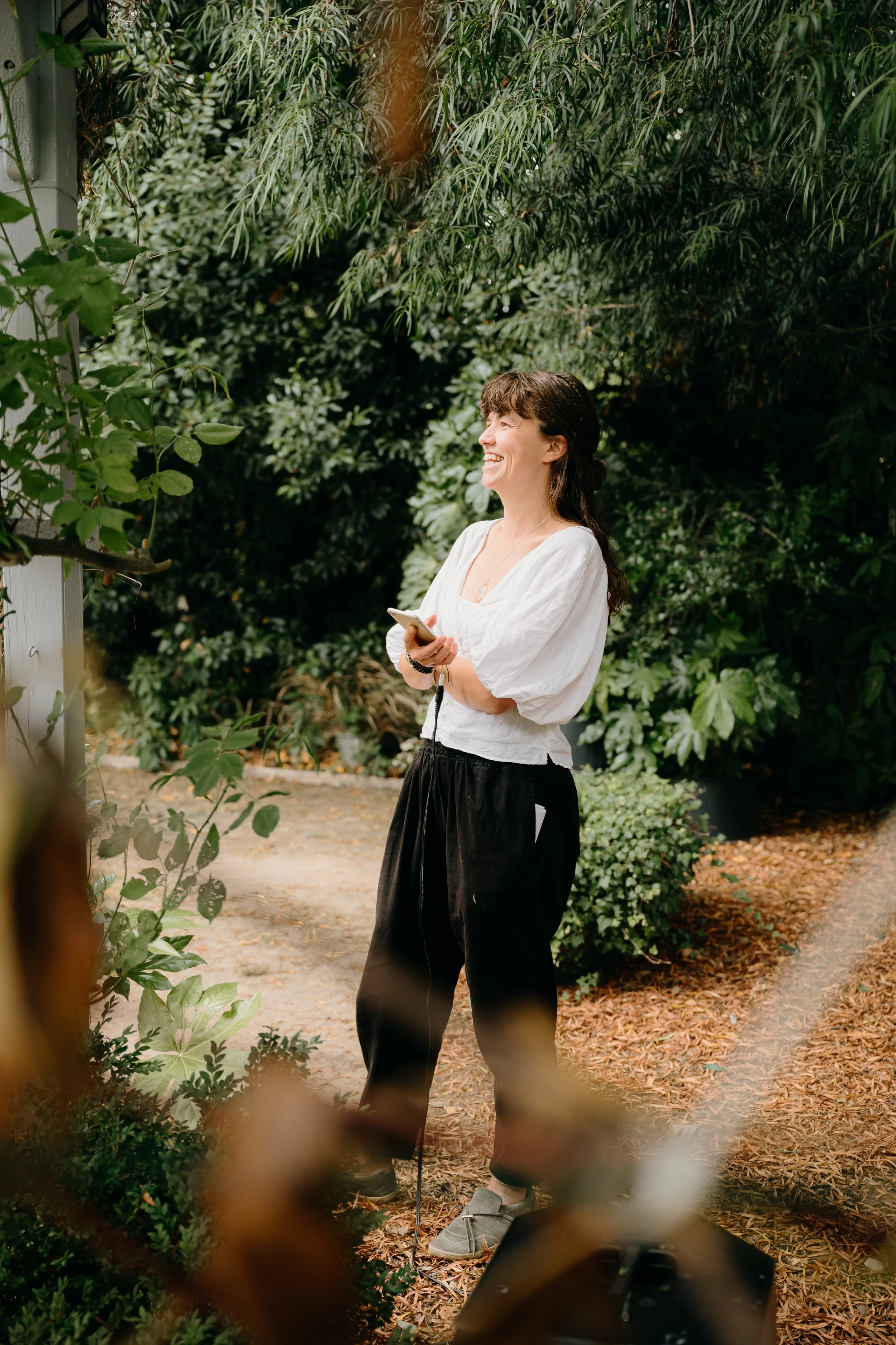 Jess from Wild Soul Weddings, eco wedding planners in the UK, organising a wedding. Martin Dabeck Photography.