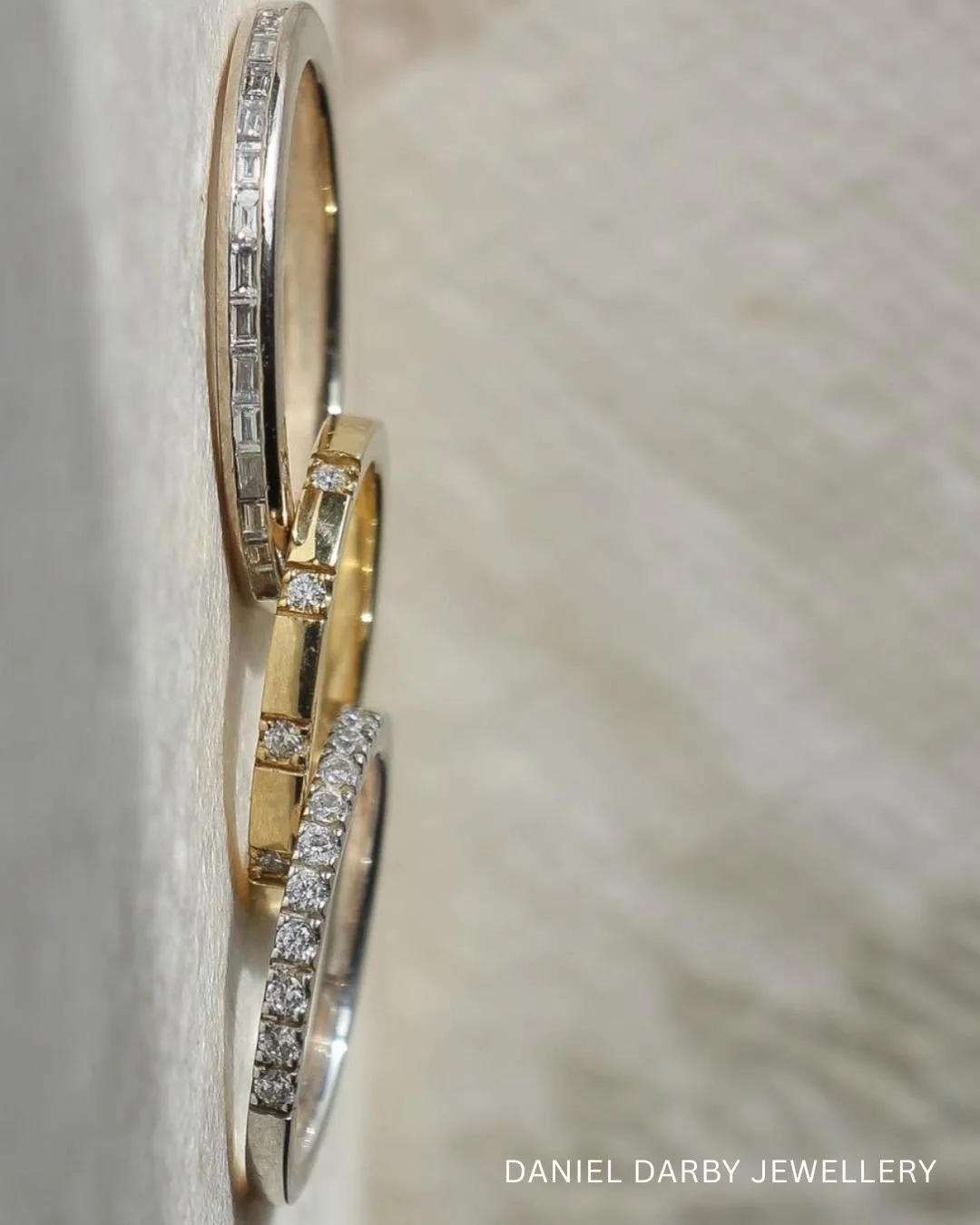 Bespoke wedding bands with diamonds by Daniel Darby Jewellery.

