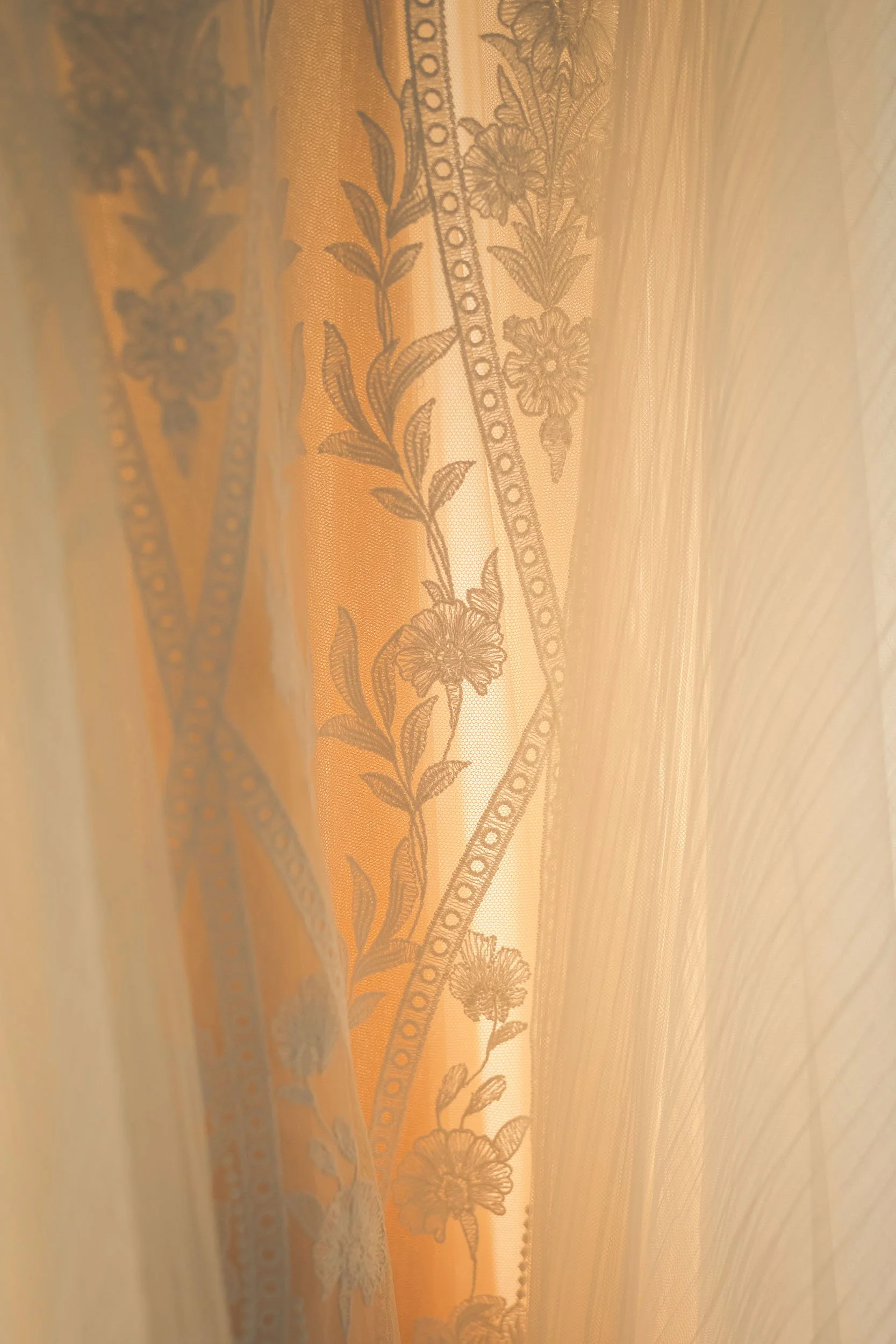 A close up of a wedding dress for a styled shoot.
