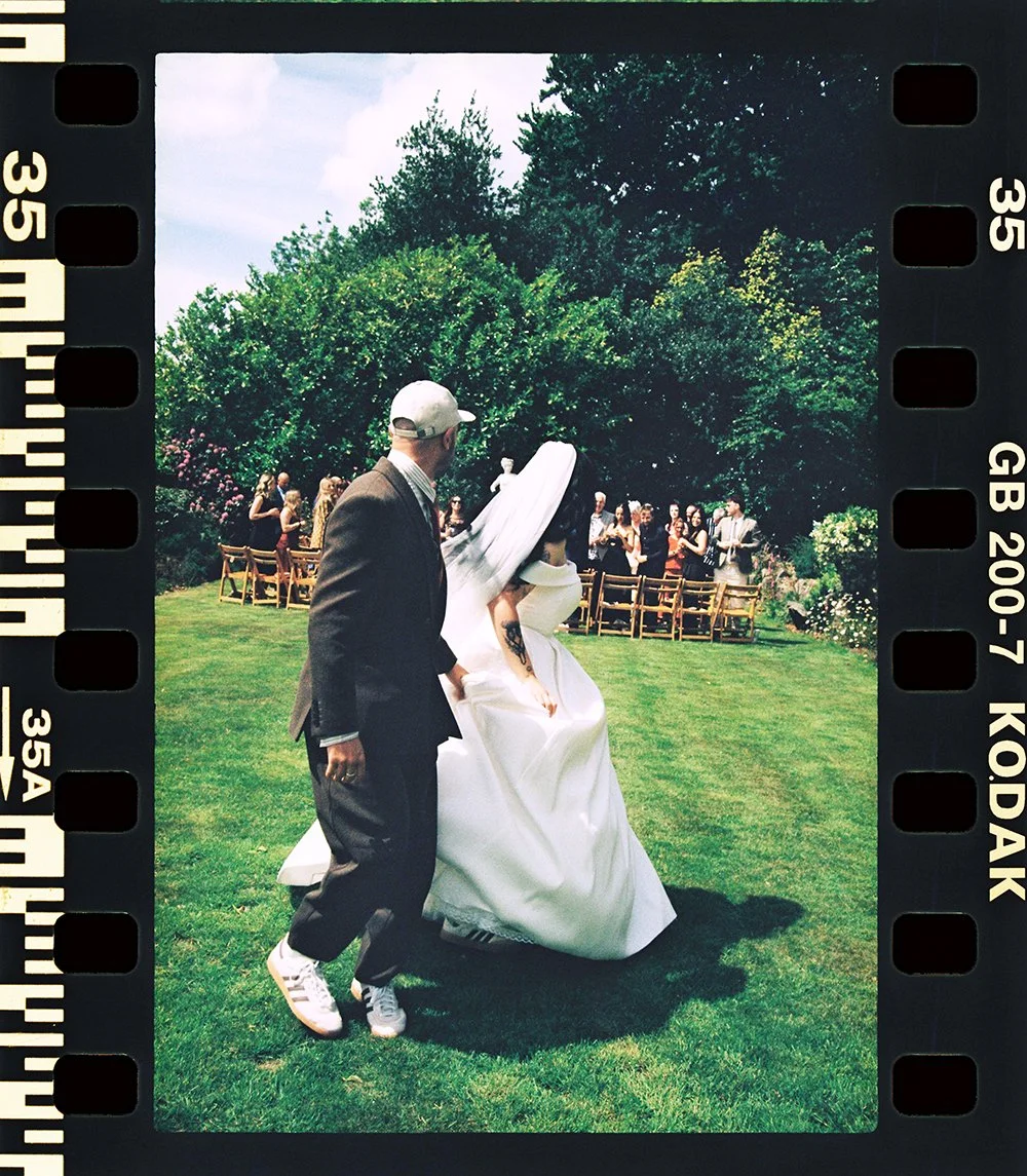 Elizabeth Royse Photography captures weddings with a raw and cinematic eye that blends documentary sharpness with playful editorial flair, shown through her intimate portraits, deliberate use of film textures, and attention to candid in-between momen