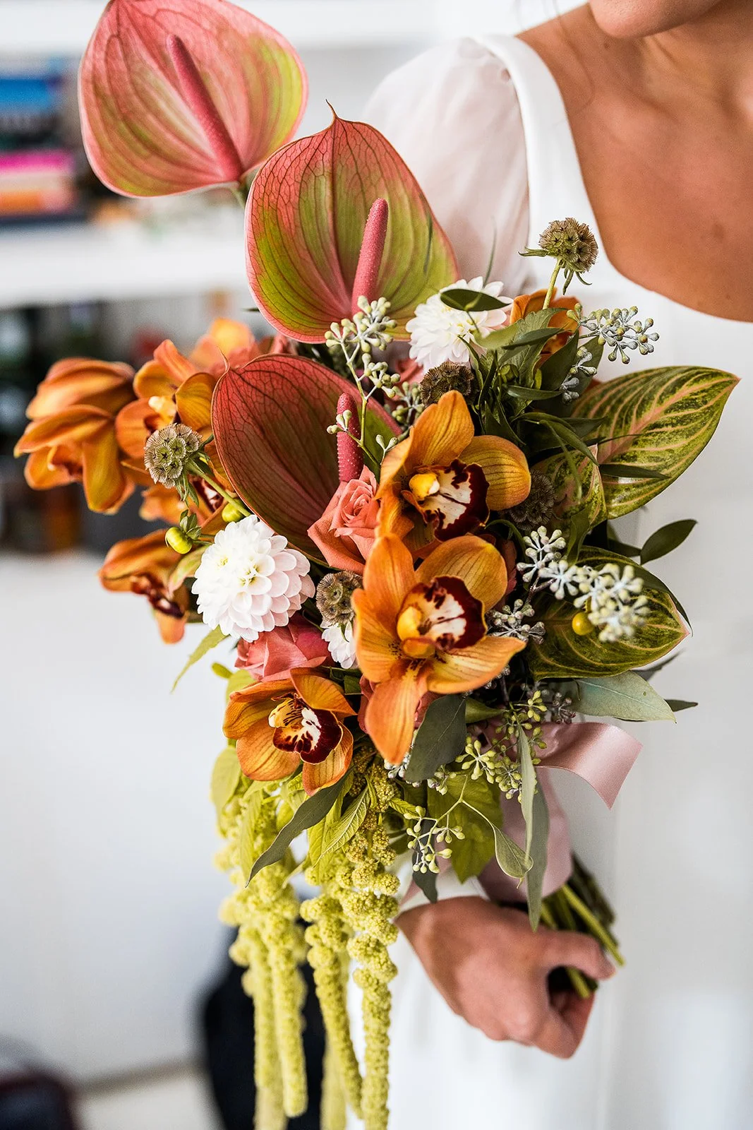 A stunning bridal bouquet with pinks and greens.
