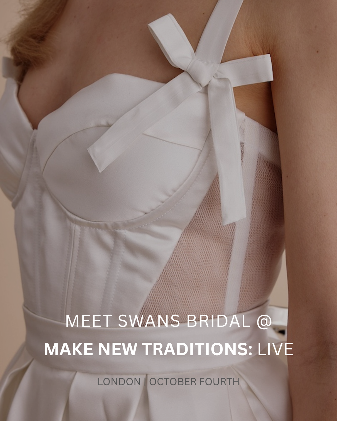 A close up of a bridal corset by Swans Bridal.